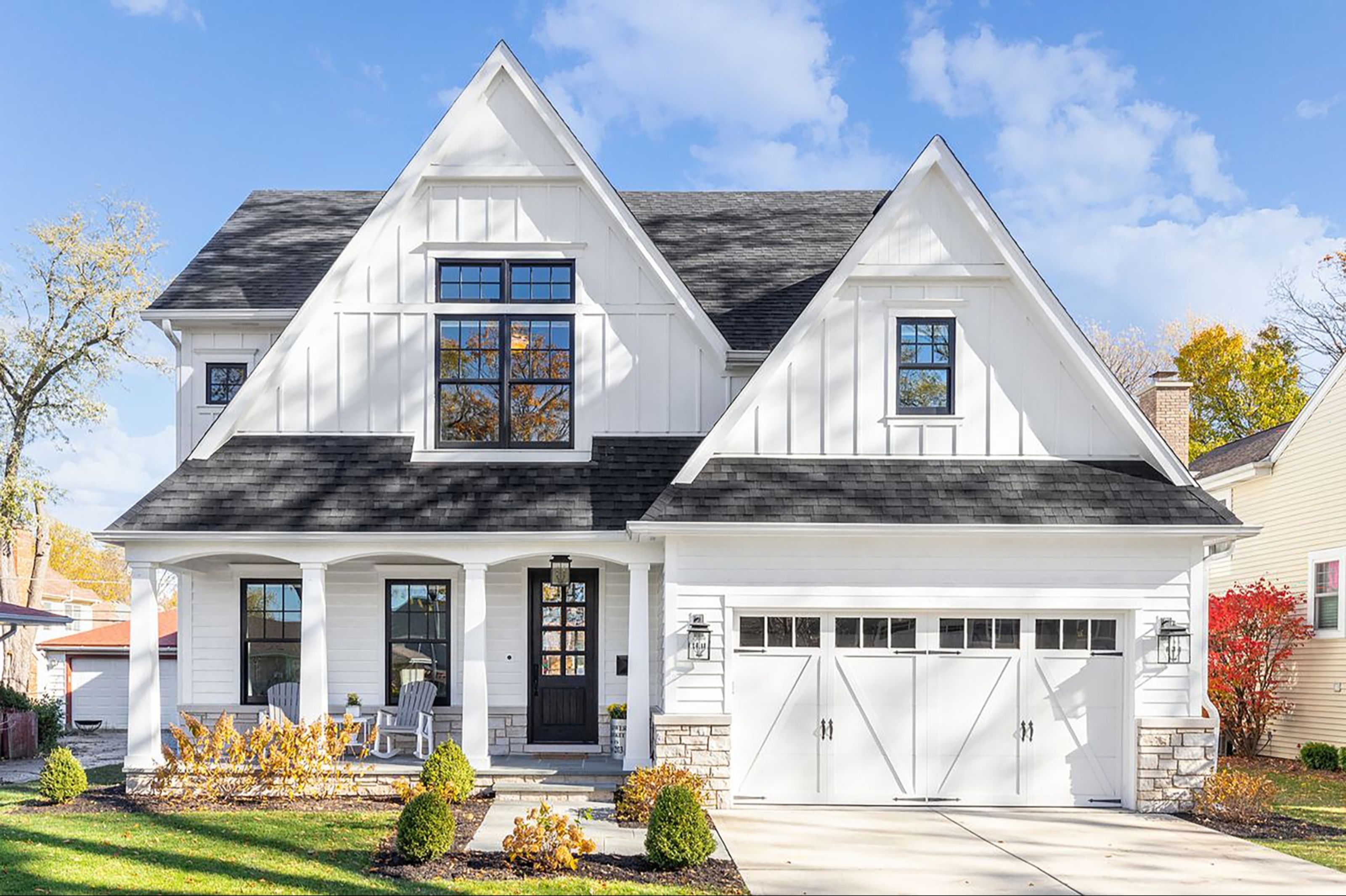 Home exterior before renovation — original white farmhouse